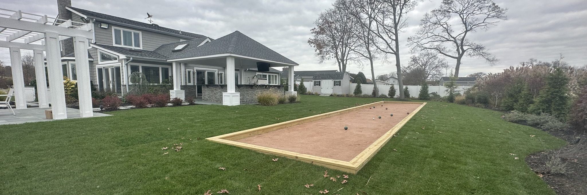 Coastal bocce ball court landscaping
