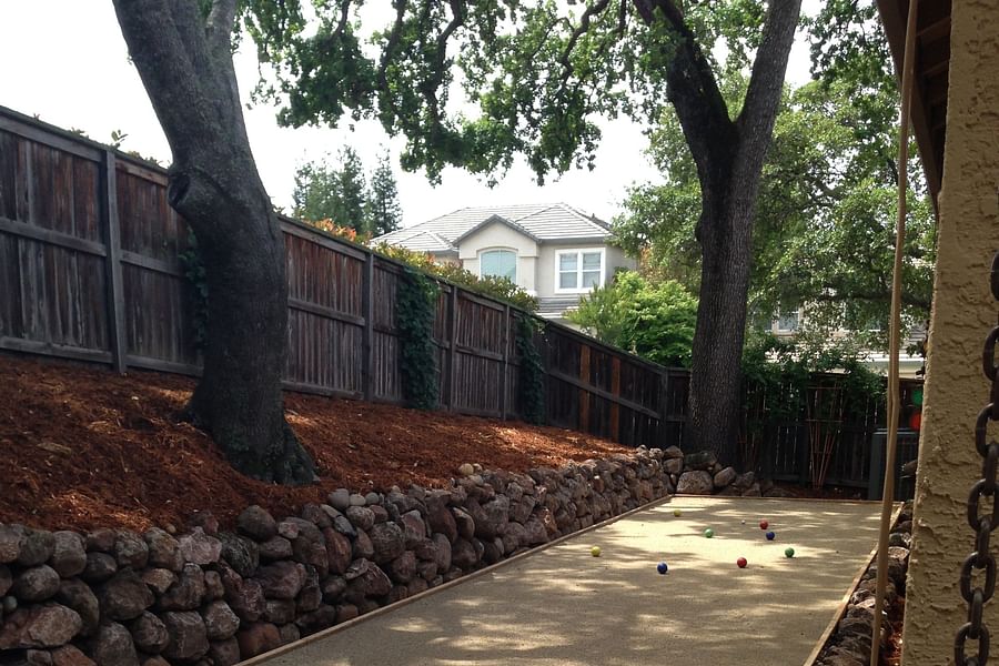 Rustic bocce ball court design